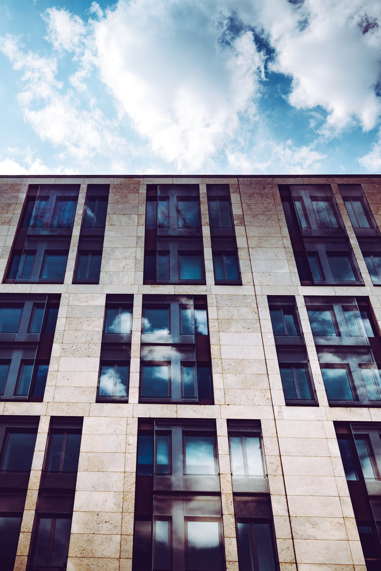 Building Under Blue Sky and White Clouds